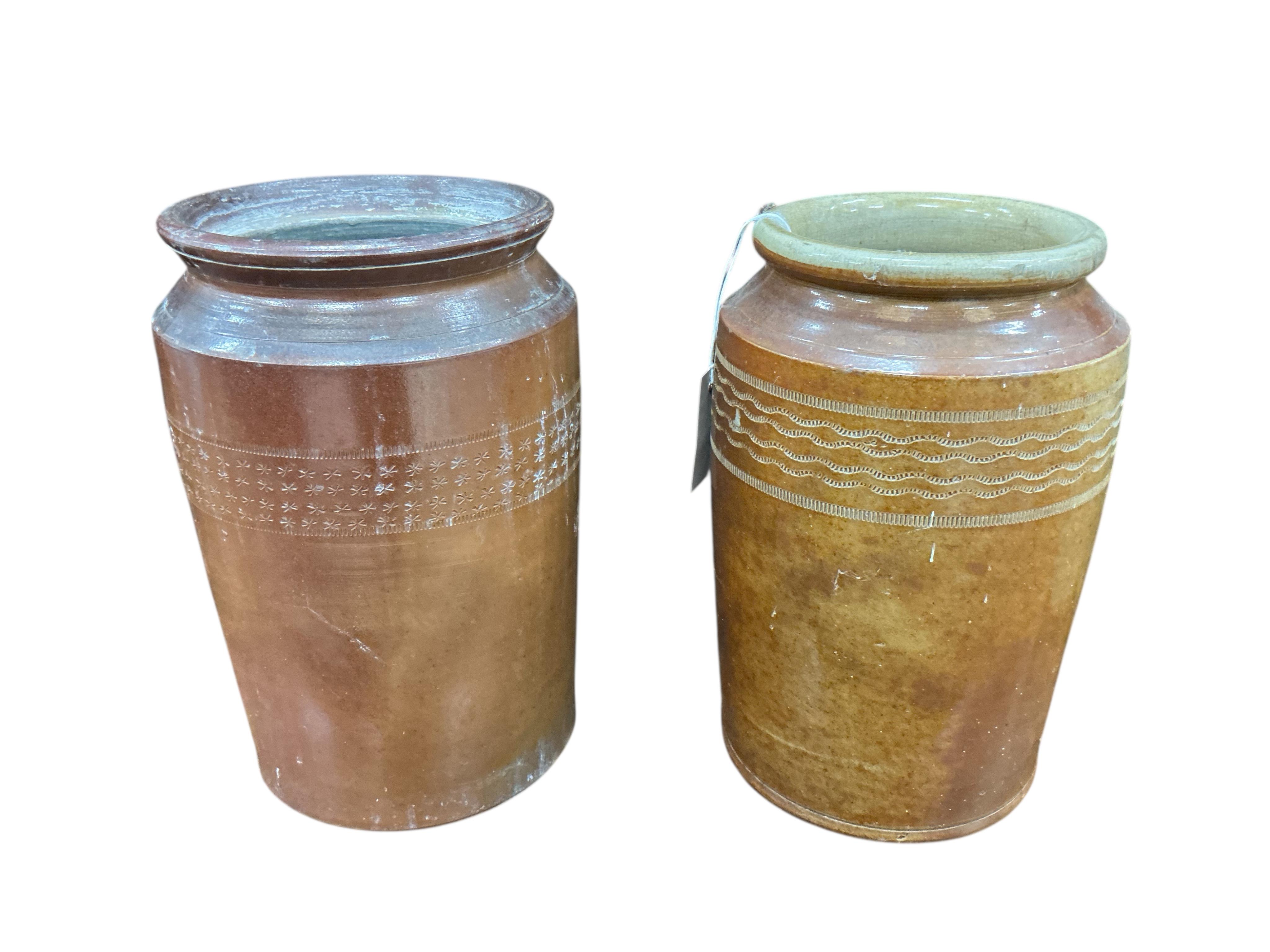 Five 19th century and later earthenware jars, largest height 32cm